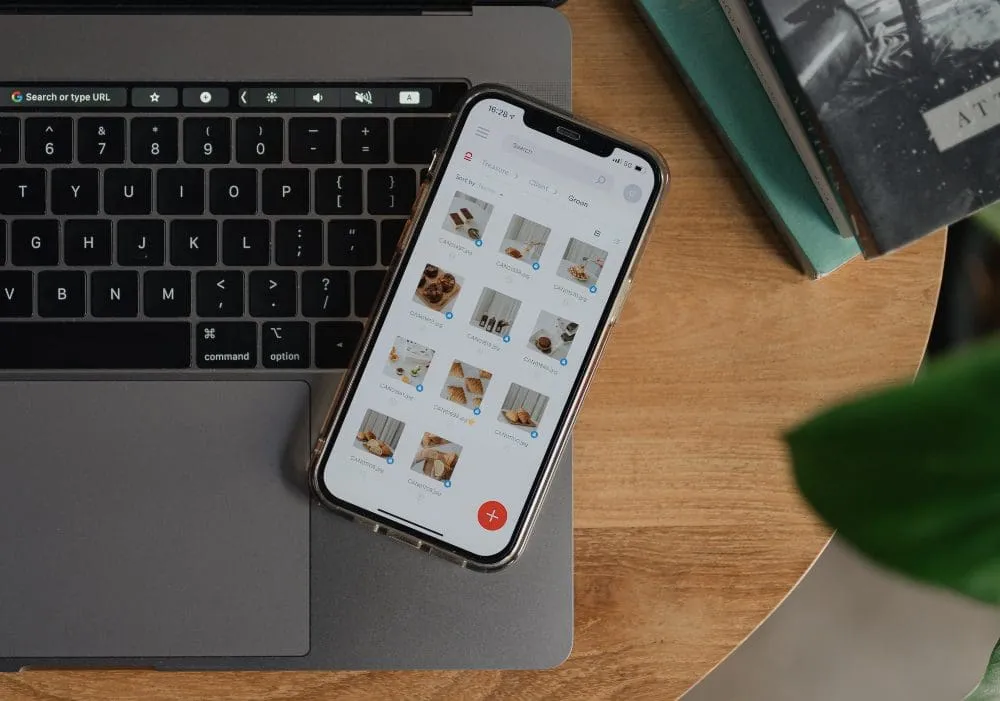 smart phone on laptop