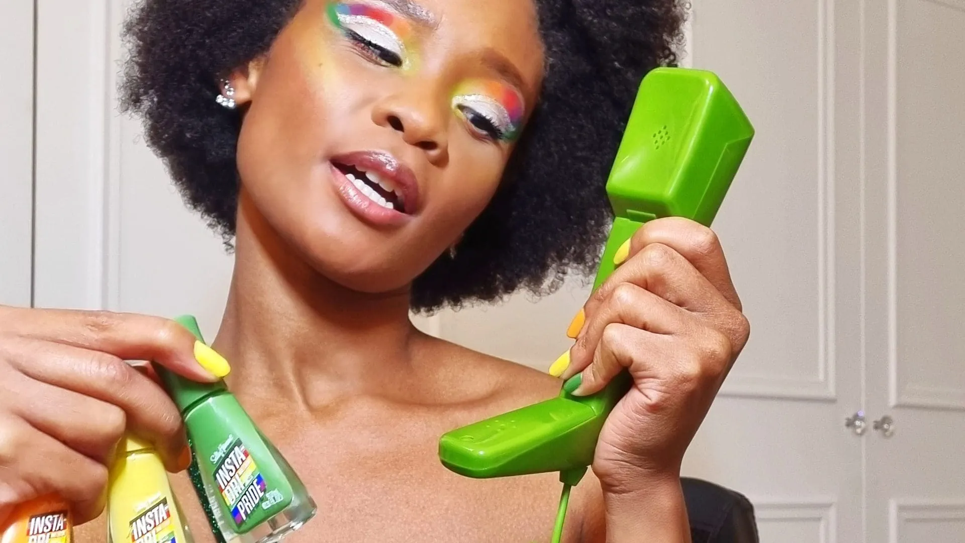 woman holding green phone