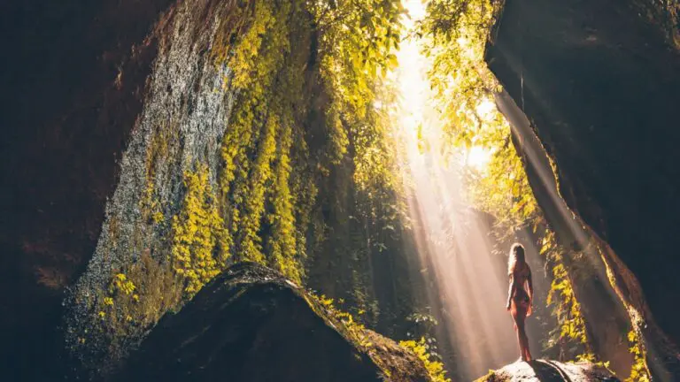 woman at bottom of cave