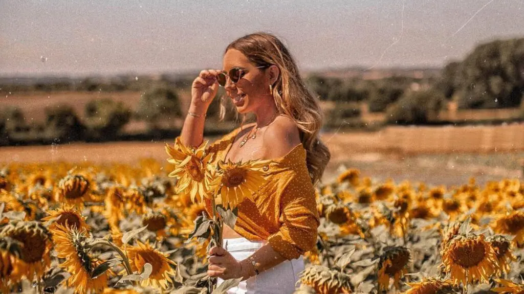 woman in sunflower field