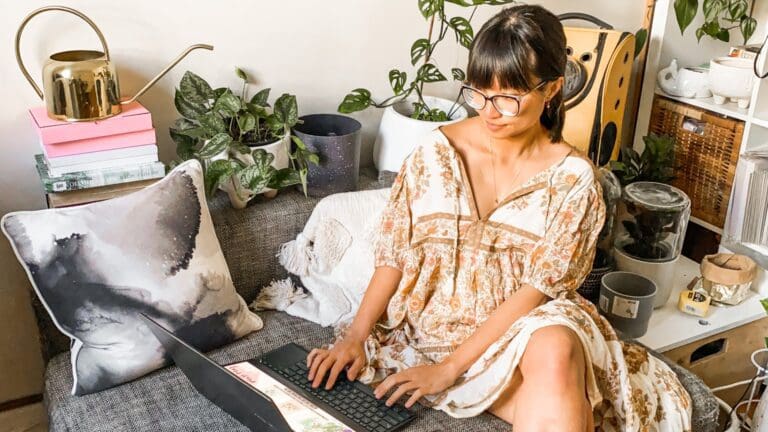 woman on laptop wearing glasses