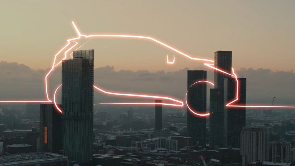 city scape with photoshopped outline of a car in neon light