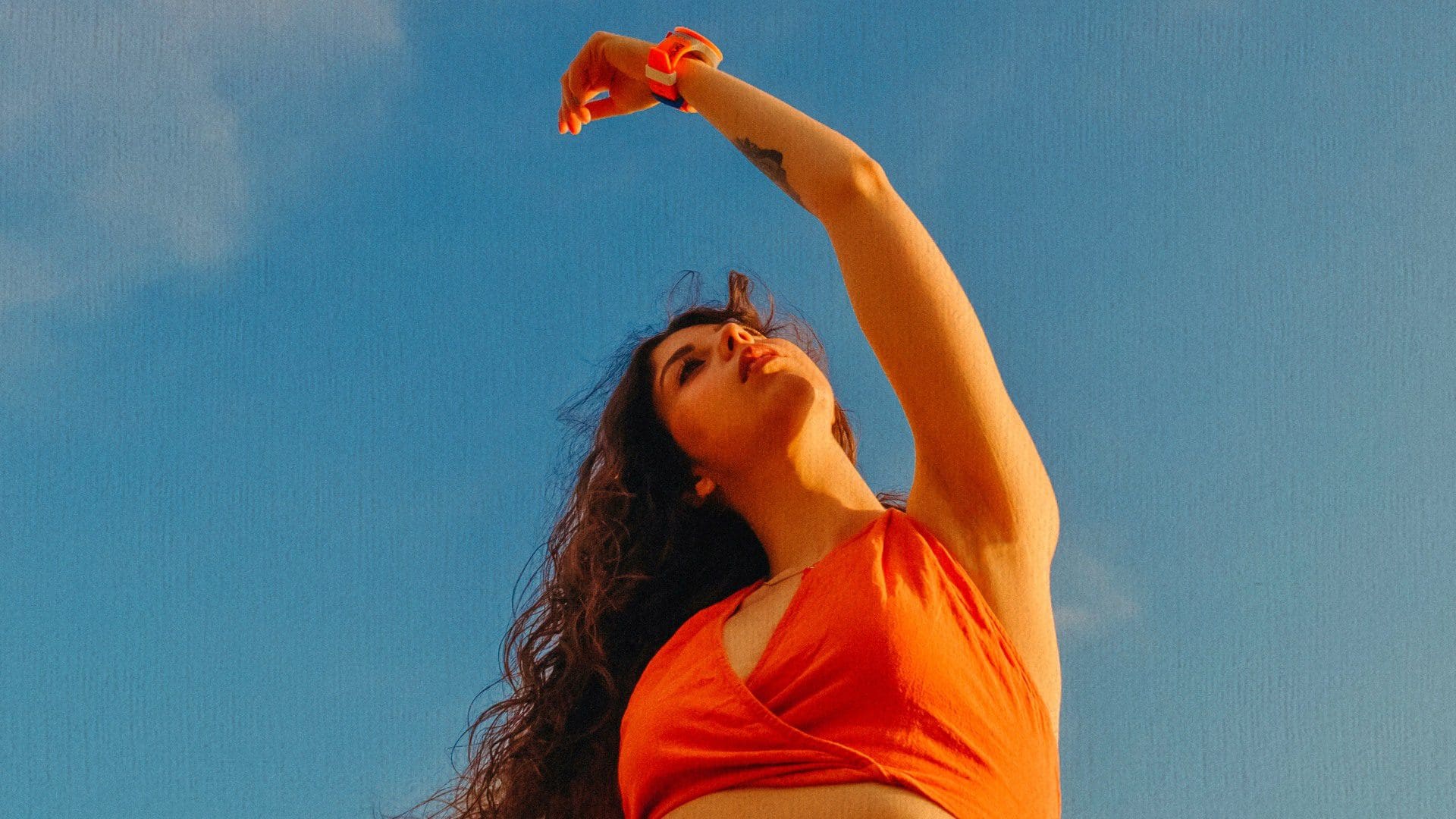 woman in orange top