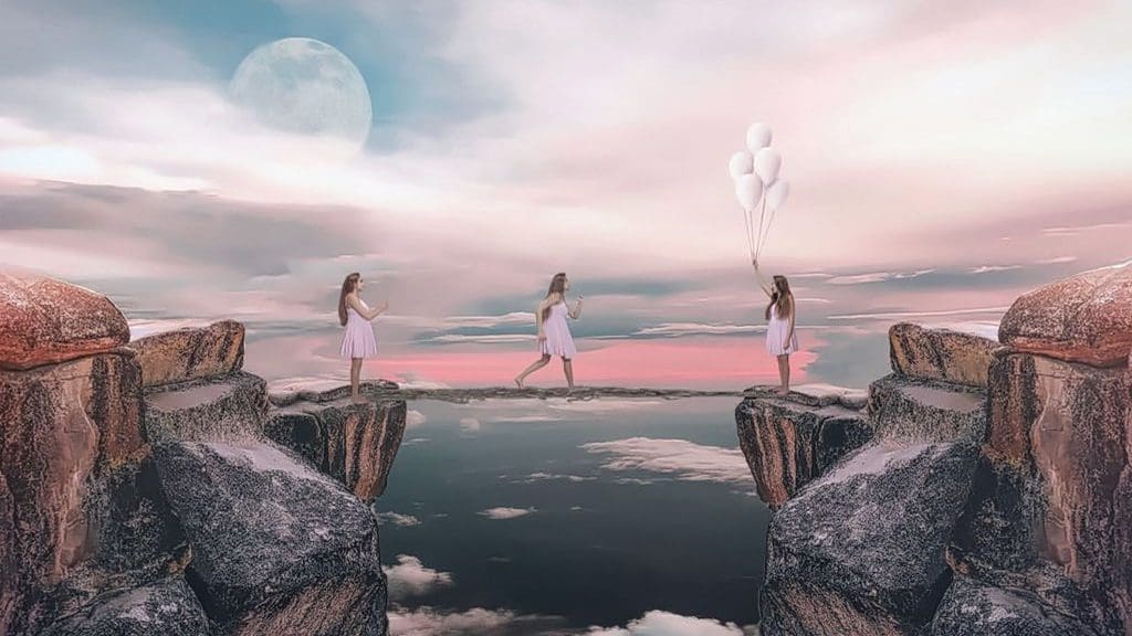 three women crossing bridge between two cliffs - webinar blog header
