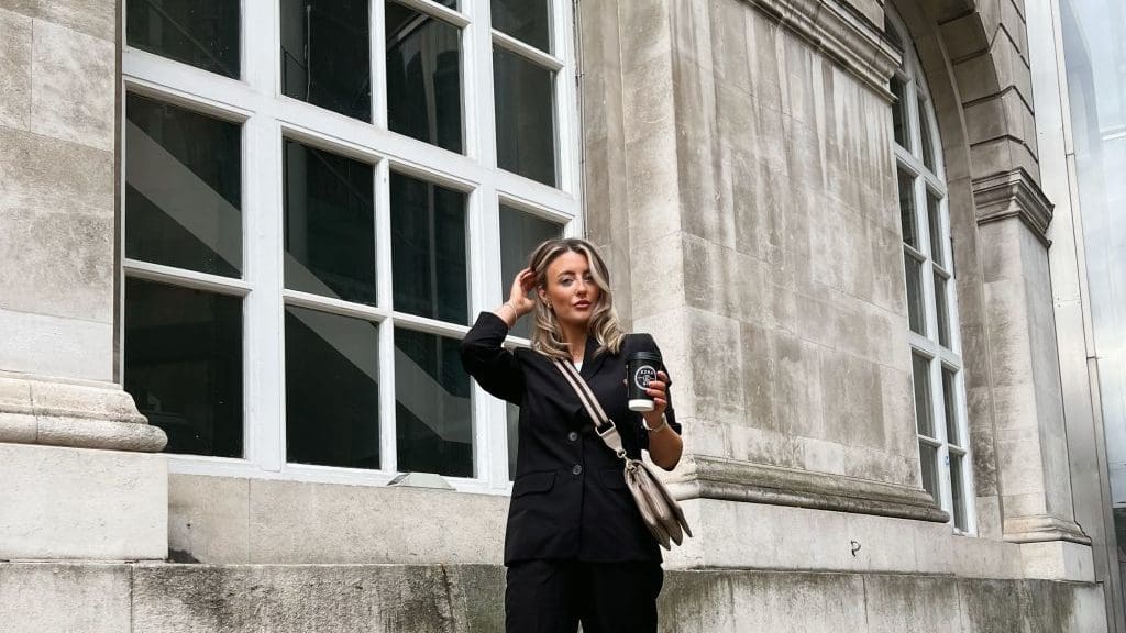woman in front of london building